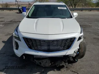 2023 Cadillac XT4 FWD Luxury with VIN 1GYAZAR46PF134602, listed as a Copart auction lot 54684865 with 13,221 mi miles and Salvage title. Bid and sale history available at DreamBid. Image 5.