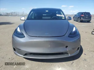 2025 Tesla Model Y Long Range with VIN 7SAYGDED0SF247561, listed as a Copart auction lot 50736875 with 9,094 mi miles and Salvage Title. Bid and sale history available at DreamBid. Image 5.