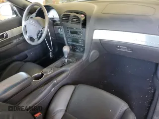 2002 Ford Thunderbird Hardtop Premium z VIN 1FAHP60A52Y130277, wystawiony jako Copart lot #69473594 z przebiegiem Nie podano mil oraz Szkoda całkowita • Salvage title. Historia ofert i sprzedaży dostępna na DreamBid. Obrazek 8.