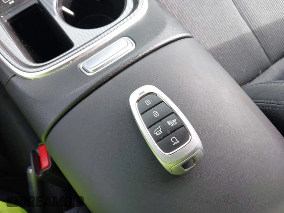 2022 Hyundai Santa Fe SEL with VIN 5NMS64AJ6NH393466, listed as a IAAI auction lot 41943864 with 12,676 mi miles and . Bid and sale history available at DreamBid. Image 11.