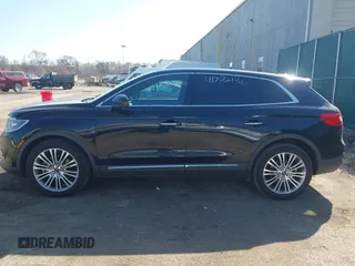 2016 Lincoln MKX Reserve with VIN 2LMTJ8LRXGBL79973, listed as a IAAI auction lot 41772136 with 105,566 mi miles. Bid and sale history available at carsss.com. Image 14.