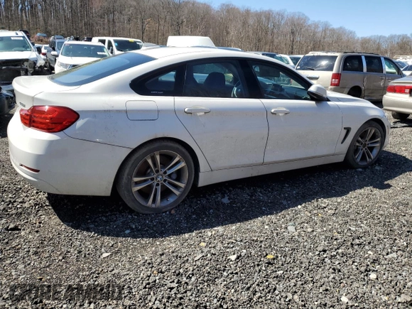 2015 BMW 4 Series 428i z VIN WBA4A9C53FGL85500, wystawiony jako Copart lot #50004575 z przebiegiem 129 018 mil mil oraz Szkoda całkowita • Salvage title. Historia ofert i sprzedaży dostępna na DreamBid. Obrazek 3.