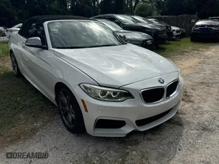 2015 BMW 2 Series M235i with VIN WBA1M1C56FV393758, listed as a Copart auction lot 81534244 with 51,015 mi miles and Salvage Title. Bid and sale history available at carsss.com. Image 1.