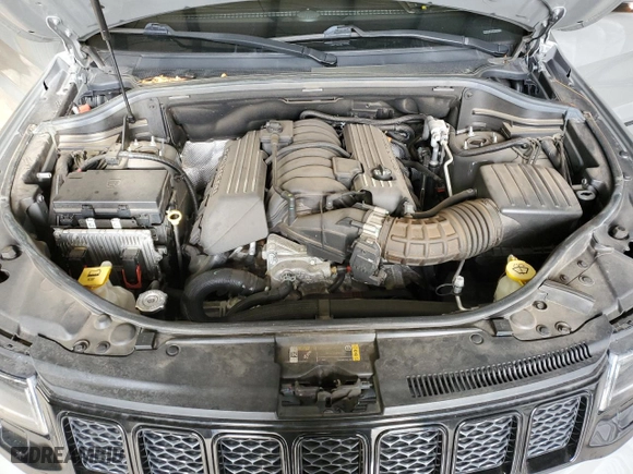 2021 Jeep Grand Cherokee SRT with VIN 1C4RJFDJ5MC667774, listed as a Copart auction lot 42484435 with 43,387 mi miles and Salvage Title. Bid and sale history available at carsss.com. Image 12.