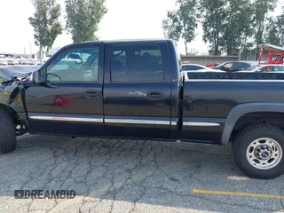 2002 GMC Sierra 1500HD SLE z VIN 1GTGC13U12F134493, wystawiony jako IAAI lot #40392044 z przebiegiem 157 996 mil mil oraz . Historia ofert i sprzedaży dostępna na DreamBid. Obrazek 14.