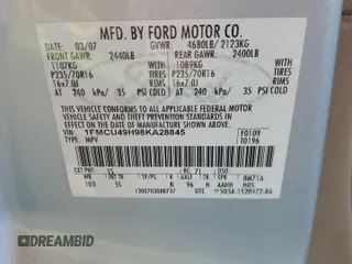 2008 Ford Escape Hybrid with VIN 1FMCU49H98KA28845, listed as a Copart auction lot 52648135 with 210,756 mi miles and Salvage title. Bid and sale history available at DreamBid. Image 12.