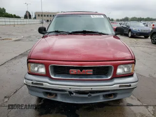 1997 GMC Jimmy SLS with VIN 1GKDT13W8V2515536, listed as a Copart auction lot 66701094 with 123,051 mi miles and Salvage Title. Bid and sale history available at carsss.com. Image 5.