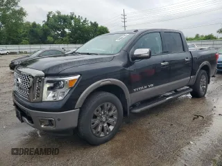 2018 Nissan Titan SV with VIN 1N6AA1E52JN541998, listed as a Copart auction lot 59601785 with 51,133 mi miles and Salvage title. Bid and sale history available at DreamBid. Image 1.