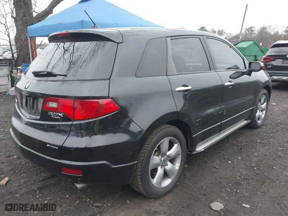 2009 Acura RDX Tech Pkg with VIN 5J8TB18599A000519, listed as a IAAI auction lot 41914817 with 204,441 mi miles. Bid and sale history available at carsss.com. Image 4.