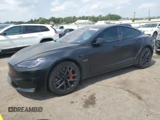 2022 Tesla Model S Plaid with VIN 5YJSA1E66NF460913, listed as a Copart auction lot 60534665 with 47,595 mi miles and Salvage title. Bid and sale history available at DreamBid. Image 1.