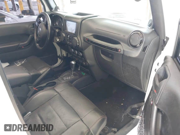 2012 Jeep Wrangler Unlimited Sahara with VIN 1C4BJWEG7CL275883, listed as a IAAI auction lot 42510764 with 149,531 mi miles and . Bid and sale history available at DreamBid. Image 5.