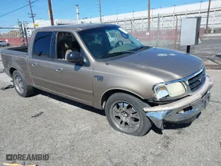 2001 Ford F-150 SuperCrew XLT with VIN 1FTRW07W21KF75187, listed as a IAAI auction lot 41619207 with NaN miles. Bid and sale history available at carsss.com. Image 1.