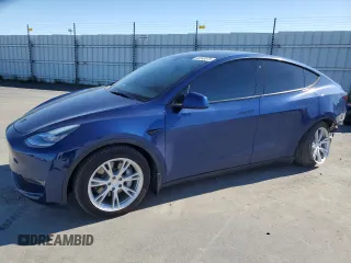 2021 Tesla Model Y Long Range z VIN 5YJYGDEE6MF089493, wystawiony jako Copart lot #48349575 z przebiegiem 52 245 mil mil oraz Szkoda całkowita • Salvage title. Historia ofert i sprzedaży dostępna na DreamBid. Obrazek 1.