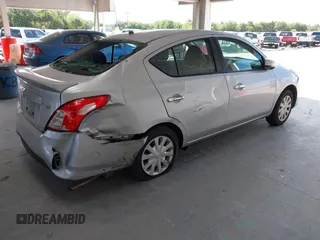 2019 Nissan Versa SV z VIN 3N1CN7AP0KL843210, wystawiony jako IAAI lot #42153678 z przebiegiem 94 408 mil mil oraz . Historia ofert i sprzedaży dostępna na DreamBid. Obrazek 4.