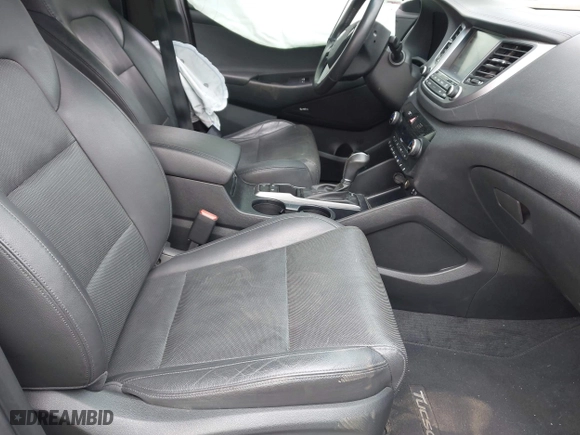 2017 Hyundai Tucson Value with VIN KM8J33A21HU359113, listed as a IAAI auction lot 41897638 with 80,010 mi miles. Bid and sale history available at carsss.com. Image 5.