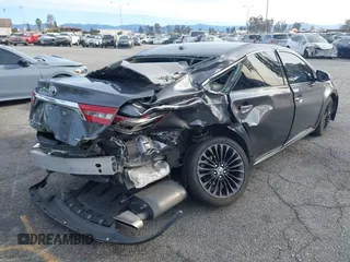2016 Toyota Avalon Limited with VIN 4T1BK1EB8GU195475, listed as a IAAI auction lot 41321885 with 84,416 mi miles and . Bid and sale history available at DreamBid. Image 4.