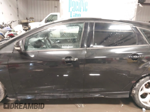 2014 Ford Focus ST with VIN 1FADP3L91EL375674, listed as a IAAI auction lot 41572329 with 100,253 mi miles and . Bid and sale history available at carsss.com. Image 14.