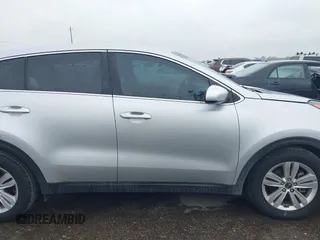 2018 Kia Sportage LX with VIN KNDPM3AC7J7337951, listed as a IAAI auction lot 41900482 with 105,857 mi miles and . Bid and sale history available at carsss.com. Image 13.