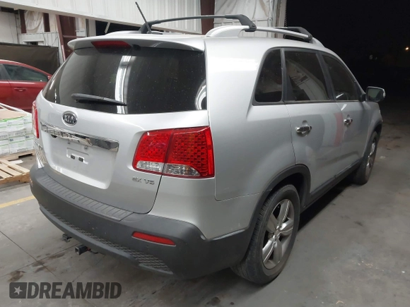 2012 Kia Sorento EX with VIN 5XYKU4A20CG290324, listed as a IAAI auction lot 41703467 with 132,168 mi miles. Bid and sale history available at carsss.com. Image 4.