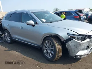 2020 Mazda CX-9 Grand Touring with VIN JM3TCBDY6L0424584, listed as a IAAI auction lot 42473920 with 32,385 mi miles and . Bid and sale history available at DreamBid. Image 6.