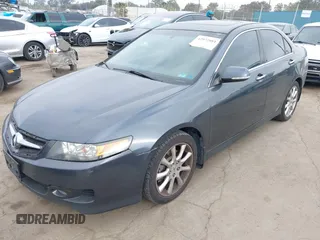 2008 Acura TSX Nav with VIN JH4CL96928C014957, listed as a IAAI auction lot 42072081 with 252,697 mi miles and . Bid and sale history available at DreamBid. Image 2.