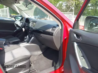2015 Mazda CX-5 Sport with VIN JM3KE2BE8F0451014, listed as a IAAI auction lot 42536333 with 131,059 mi miles and . Bid and sale history available at DreamBid. Image 5.
