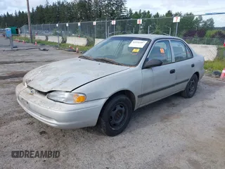 1999 Chevrolet Prizm z VIN 1Y1SK5281XZ427093, wystawiony jako IAAI lot #42251187 z przebiegiem 265 955 mil mil oraz . Historia ofert i sprzedaży dostępna na DreamBid. Obrazek 2.