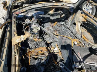 2006 MINI Convertible S with VIN WMWRH33536TK59031, listed as a Copart auction lot 51598825 with Not provided miles and Salvage title. Bid and sale history available at DreamBid. Image 8.