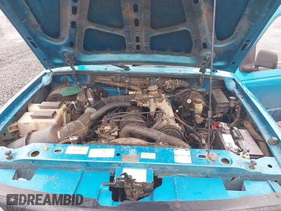 1995 Mazda B-Series Truck z VIN 4F4CR12A4STM06113, wystawiony jako IAAI lot #41674480 z przebiegiem 290 348 mil mil oraz . Historia ofert i sprzedaży dostępna na DreamBid. Obrazek 10.