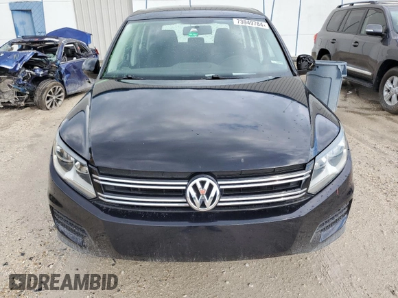 2014 Volkswagen Tiguan with VIN WVGCV3AX4EW526613, listed as a Copart auction lot 73949784 with 83,421 mi miles and Salvage Title. Bid and sale history available at DreamBid. Image 5.