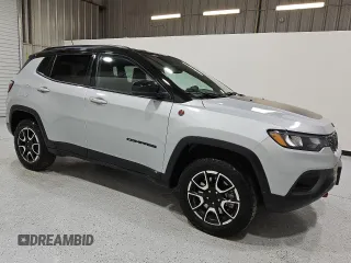 2024 Jeep Compass Trailhawk with VIN 3C4NJDDN5RT149827, listed as a Copart auction lot 55865465 with 31,565 mi miles and Clean title. Bid and sale history available at DreamBid. Image 4.