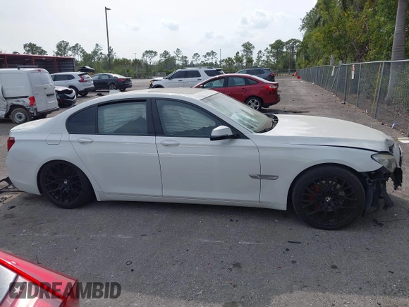 2013 BMW 7 Series 740i with VIN WBAYA6C52DD143862, listed as a IAAI auction lot 41859183 with 133,666 mi miles. Bid and sale history available at carsss.com. Image 14.