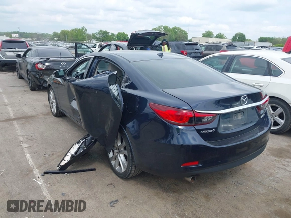2016 Mazda Mazda6 i Touring with VIN JM1GJ1V59G1402867, listed as a IAAI auction lot 41998212 with 135,724 mi miles. Bid and sale history available at carsss.com. Image 3.