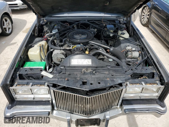1985 Cadillac Eldorado z VIN 1G6EL578XFE614641, wystawiony jako Copart lot #75663984 z przebiegiem 54 128 mil mil oraz Szkody całkowita. Historia ofert i sprzedaży dostępna na DreamBid. Obrazek 11.