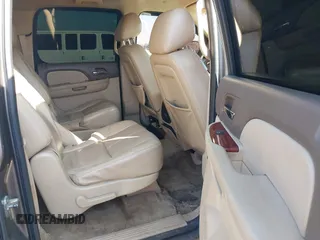 2011 Chevrolet Suburban LT with VIN 1GNSCJE03BR381301, listed as a IAAI auction lot 41412636 with 243,601 mi miles. Bid and sale history available at carsss.com. Image 8.