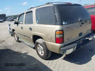 2005 Chevrolet Tahoe LS with VIN 1GNEC13V65J249079, listed as a IAAI auction lot 42127866 with 243,705 mi miles. Bid and sale history available at carsss.com. Image 3.