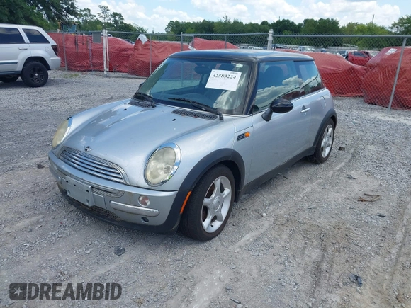 2002 MINI Hardtop with VIN WMWRC33432TE11649, listed as a IAAI auction lot 42583224 with 114,339 mi miles and . Bid and sale history available at DreamBid. Image 2.