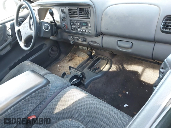 1999 Dodge Dakota SLT with VIN 1B7GG22X8XS115282, listed as a IAAI auction lot 42136576 with 220,465 mi miles and . Bid and sale history available at carsss.com. Image 5.