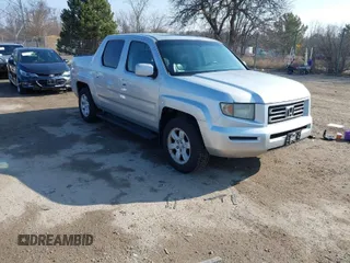 2006 Honda Ridgeline RTL with VIN 2HJYK16576H555999, listed as a IAAI auction lot 42023875 with 202,128 mi miles. Bid and sale history available at carsss.com. Image 1.