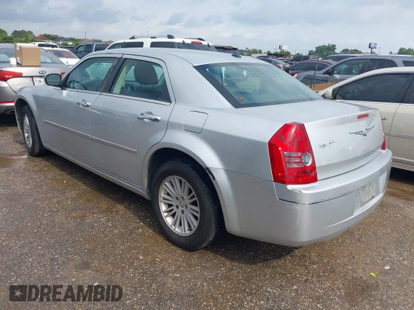 2010 Chrysler 300 Touring with VIN 2C3CA5CV1AH272993, listed as a IAAI auction lot 42154073 with 224,685 mi miles and . Bid and sale history available at DreamBid. Image 3.