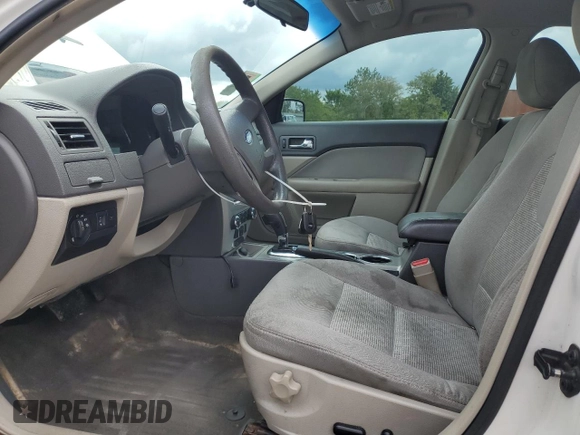 2012 Ford Fusion SE z VIN 3FAHP0HA1CR353093, wystawiony jako Copart lot #57113615 z przebiegiem 120 769 mil mil oraz Szkoda całkowita • Salvage title. Historia ofert i sprzedaży dostępna na DreamBid. Obrazek 7.