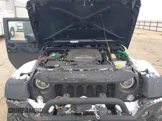 2017 Jeep Wrangler Unlimited Sport with VIN 1C4BJWDG4HL748681, listed as a IAAI auction lot 41265831 with 76,169 mi miles. Bid and sale history available at carsss.com. Image 10.
