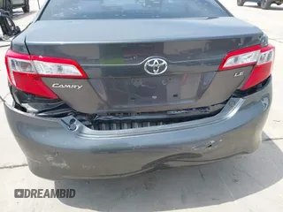 2014 Toyota Camry L with VIN 4T4BF1FKXER379158, listed as a IAAI auction lot 42050926 with 88,060 mi miles and . Bid and sale history available at DreamBid. Image 6.