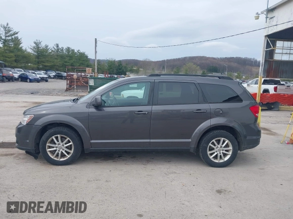 2014 Dodge Journey SXT z VIN 3C4PDDBG2ET161528, wystawiony jako IAAI lot #41932649 z przebiegiem 161 597 mil mil oraz . Historia ofert i sprzedaży dostępna na DreamBid. Obrazek 14.