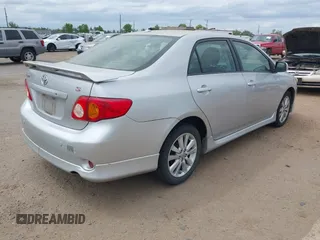 2009 Toyota Corolla with VIN 1NXBU40EX9Z028809, listed as a IAAI auction lot 42111892 with 156,182 mi miles. Bid and sale history available at carsss.com. Image 4.