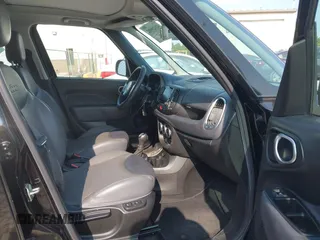2014 FIAT 500L Lounge z VIN ZFBCFACH6EZ021783, wystawiony jako IAAI lot #42429902 z przebiegiem 129 868 mil mil oraz . Historia ofert i sprzedaży dostępna na DreamBid. Obrazek 5.