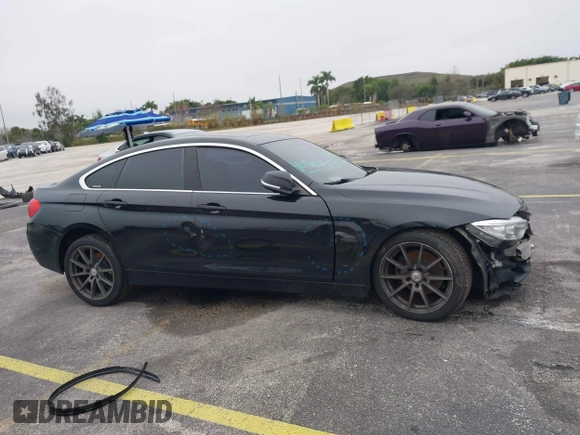 2016 BMW 4 Series 428i xDrive with VIN WBA4C9C58GG136248, listed as a IAAI auction lot 41346270 with 129,464 mi miles and . Bid and sale history available at carsss.com. Image 14.