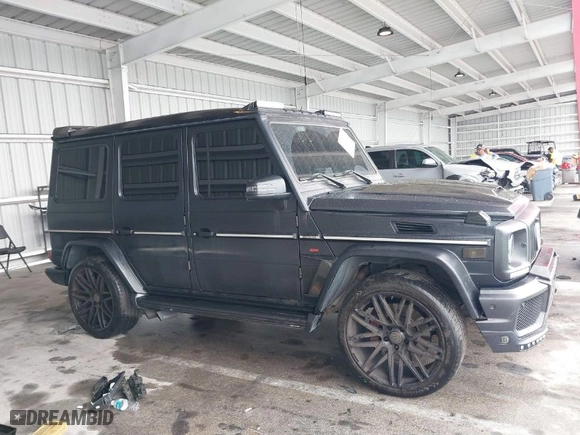 2014 Mercedes-Benz G-Class G 63 AMG with VIN WDCYC7DF7EX221914, listed as a IAAI auction lot 40192383 with NaN miles. Bid and sale history available at carsss.com. Image 13.