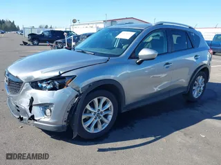 2014 Mazda CX-5 Grand Touring with VIN JM3KE2DY9E0323497, listed as a IAAI auction lot 41678360 with 216,795 mi miles. Bid and sale history available at carsss.com. Image 18.