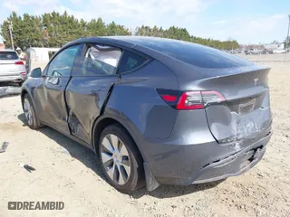 2021 Tesla Model Y Long Range with VIN 5YJYGDEE2MF300009, listed as a IAAI auction lot 41768784 with 50,107 mi miles. Bid and sale history available at carsss.com. Image 3.